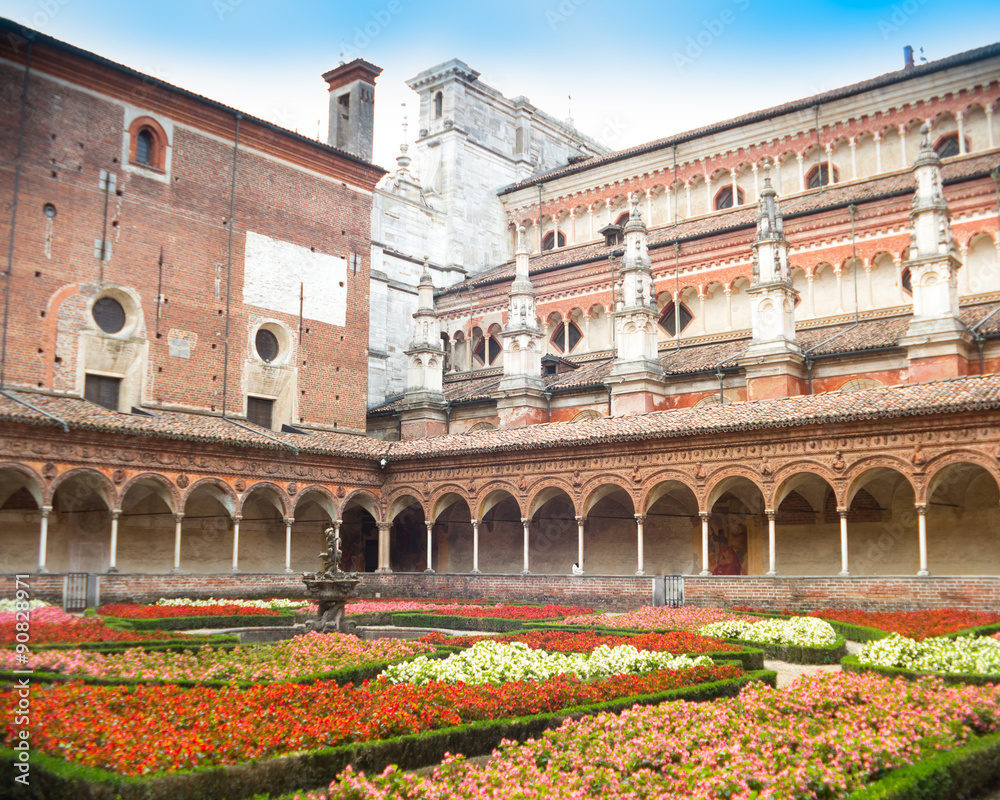 Cloister and flowers, Certosa di Pavia, Italy