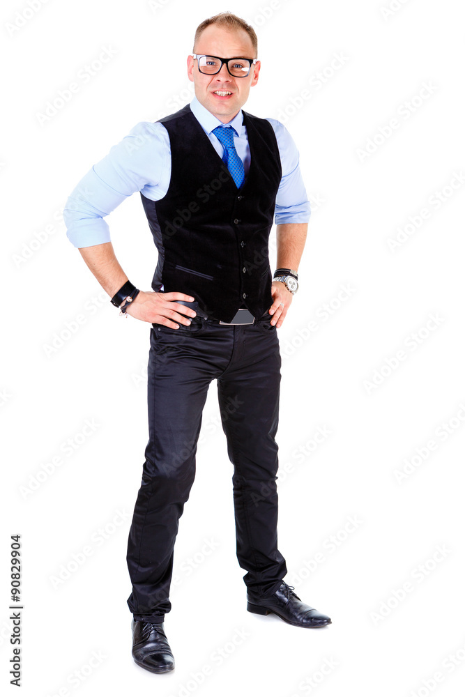 Full body portrait of young casual man in suit and tie with glasses smiling, hands on hips, isolated on white, Positive human emotion, facial expression Full body portrait of young casual man in suit and tie with glasses smiling, hands on hips, isolated on white, Positive human emotion, facial expression