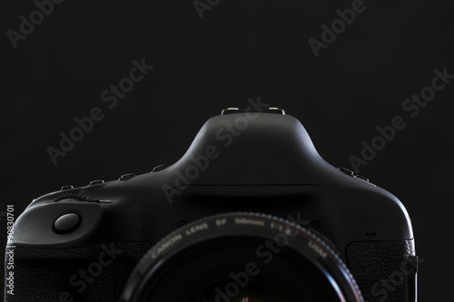 Professional modern DSLR camera low key stock photo/image - Mode