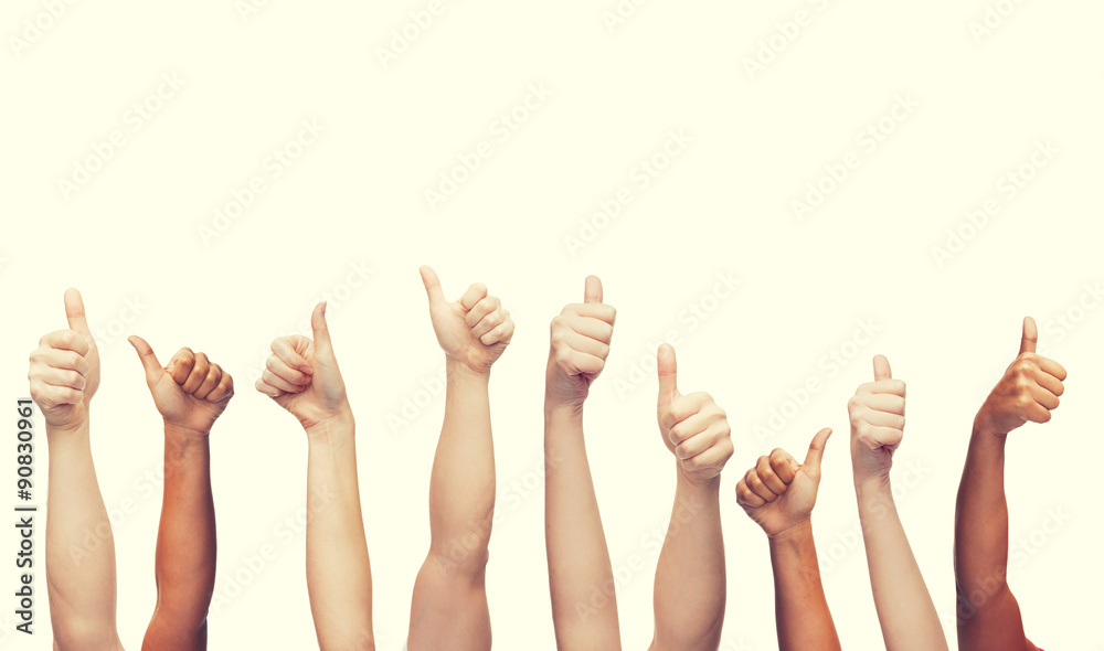 human hands showing thumbs up human hands showing thumbs up