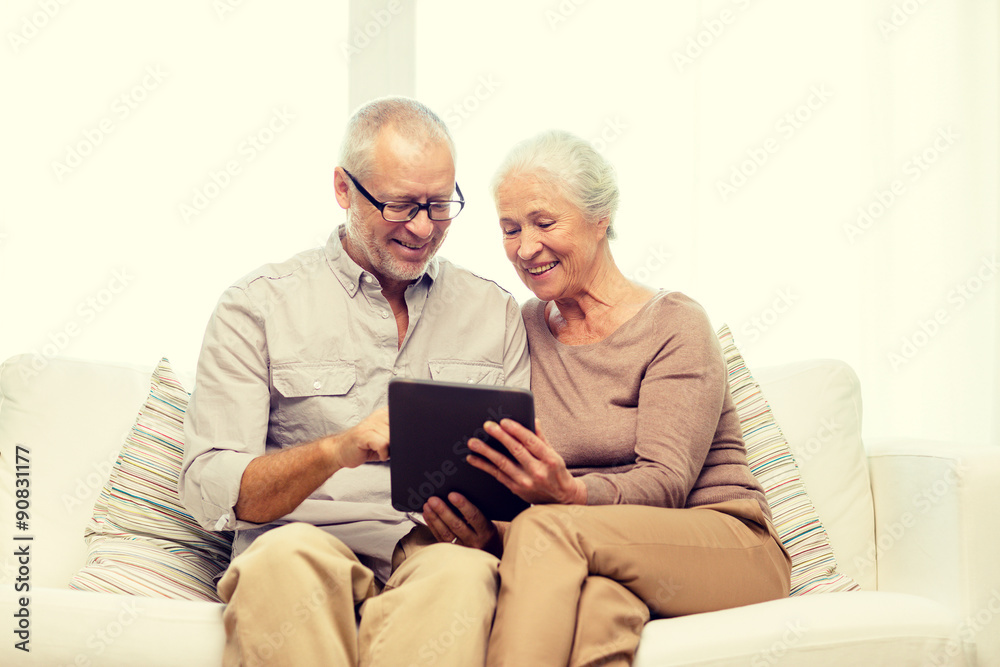 happy senior couple with tablet pc at home happy senior couple with tablet pc at home