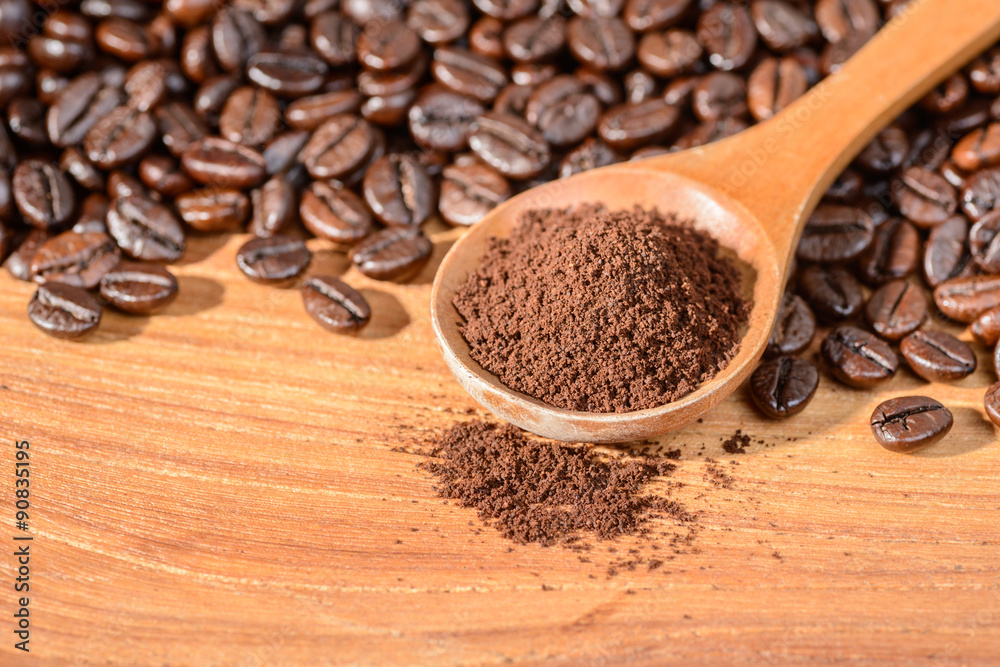 coffee powder in the wooden spoon coffee powder in the wooden spoon