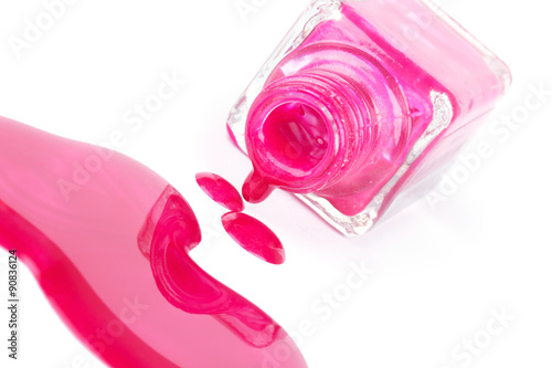 Spilled pink nail polish on white © photopixel