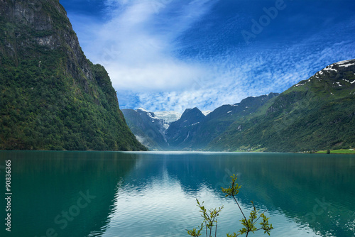 Norway mountain lake Oldenvatnet with the glacier Briksdal photo