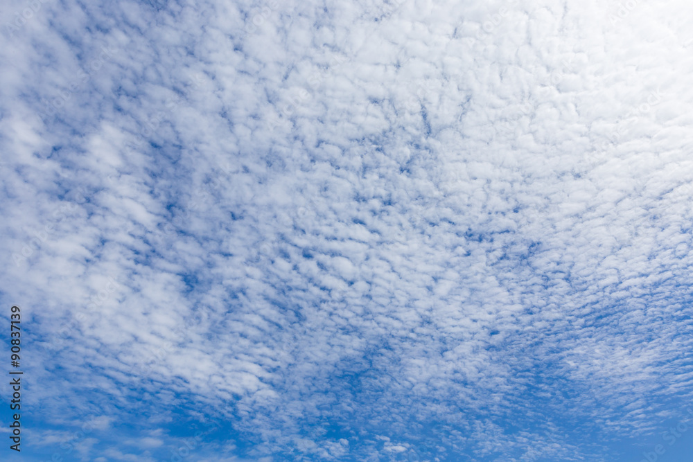 white clouds in the blue sky with space