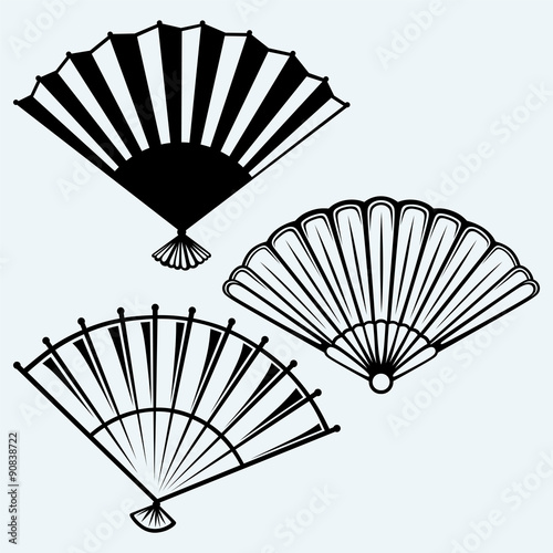 Japanese folding fan. Isolated on blue background