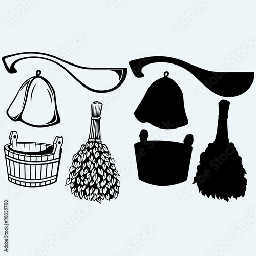 Sauna ready accessories - broom, bucket, hat and scoop. Isolated on blue background