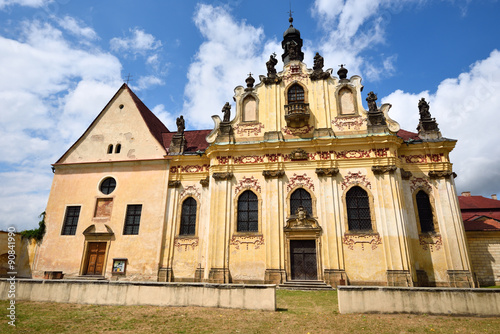 Old baroque church with statues of the saints