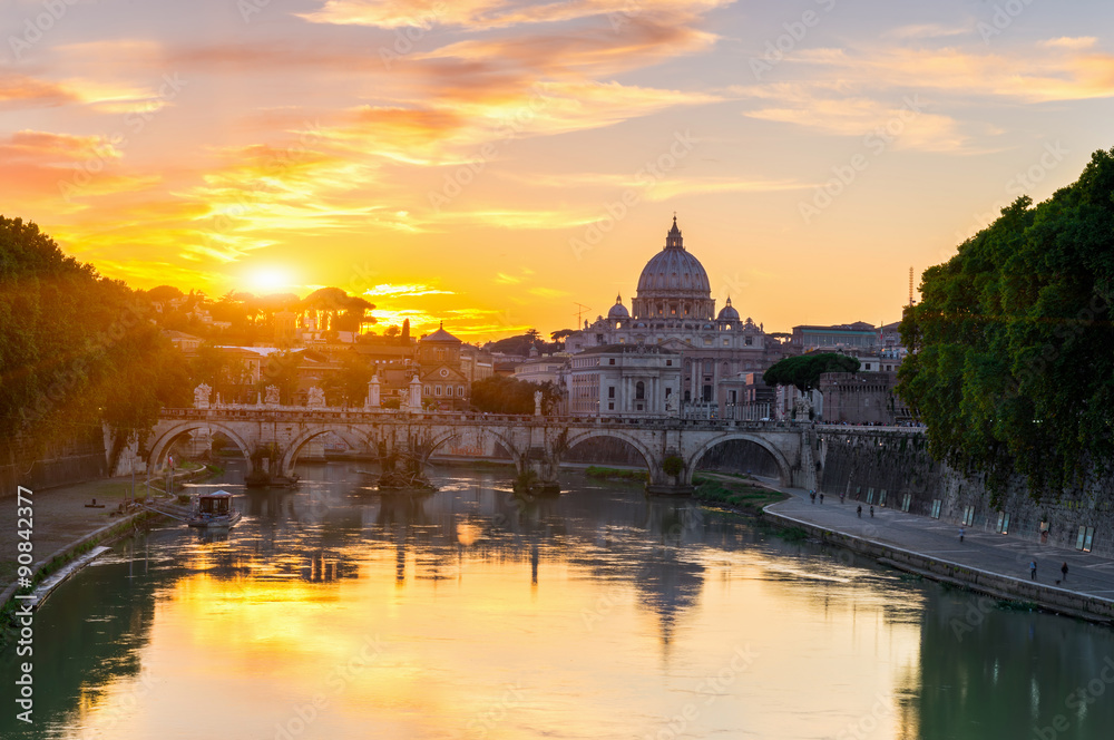 Sunset view of Basilica St Peter and river Tiber in Rome. Italy
