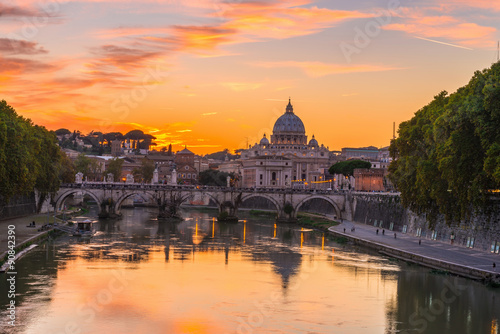 Sunset view of Basilica St Peter and river Tiber in Rome. Italy 