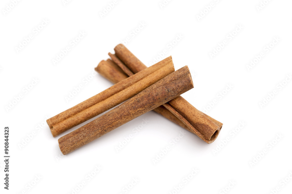 Cinnamon on the white background Cinnamon on the white background