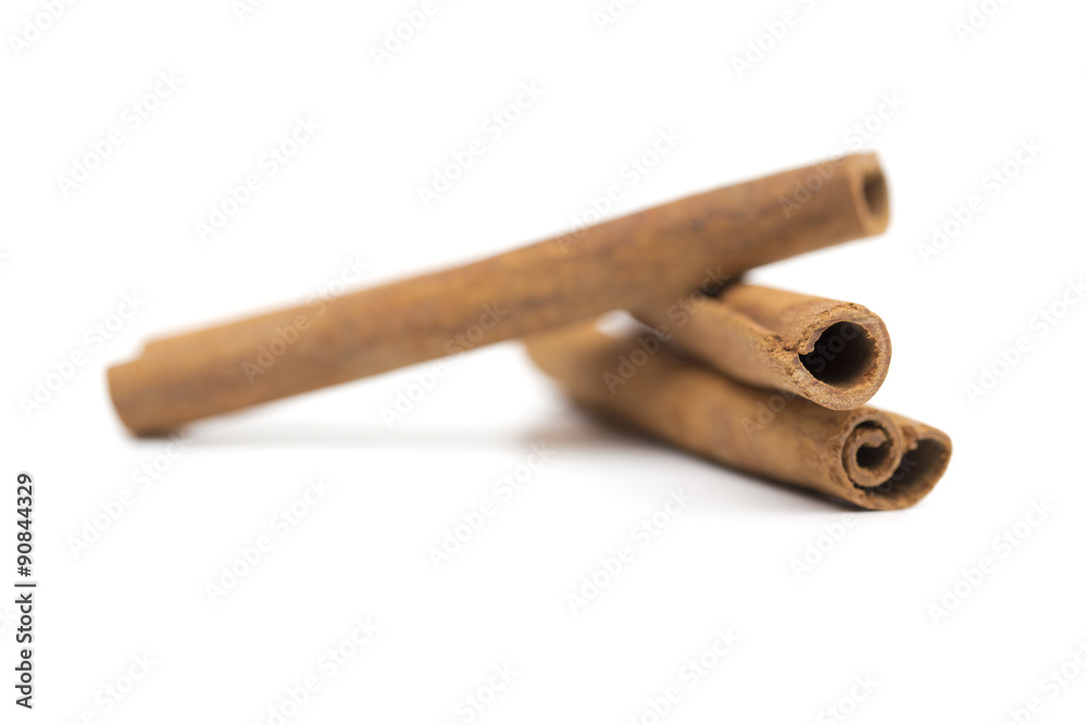 Cinnamon on the white background Cinnamon on the white background