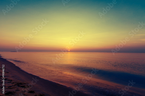 Sunrise over tropical sea and beach in Thailand