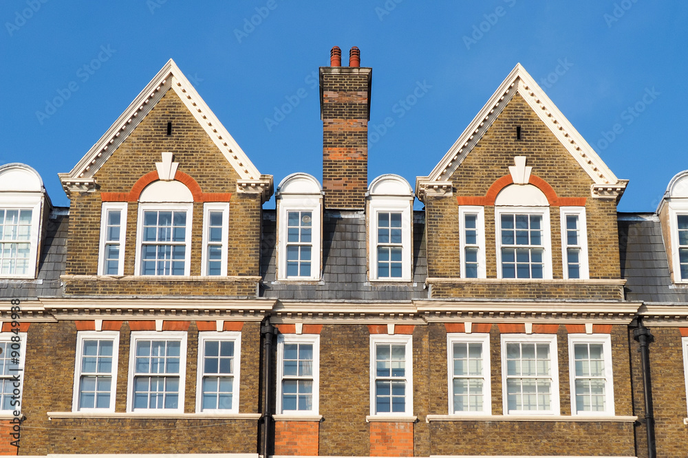 Typical London buildings roofs with chimney