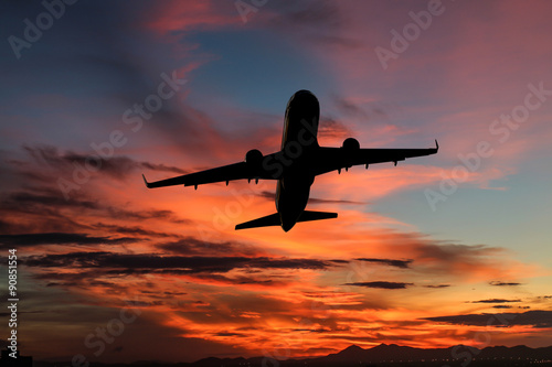 Airplane on sunrise with beautiful sky at twilight time