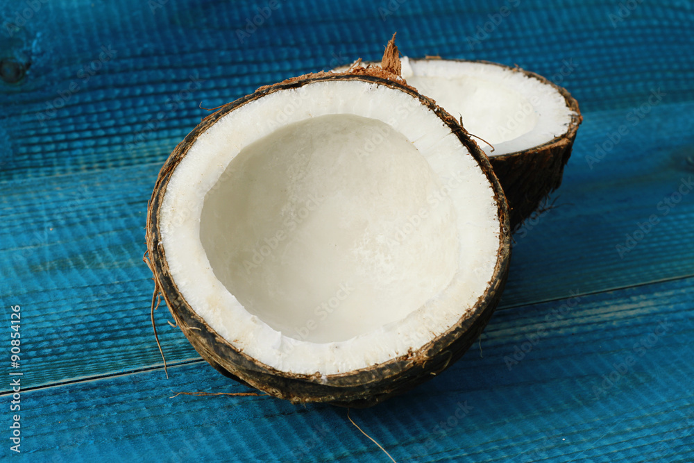 Coconut on blue rustic background Coconut on blue rustic background