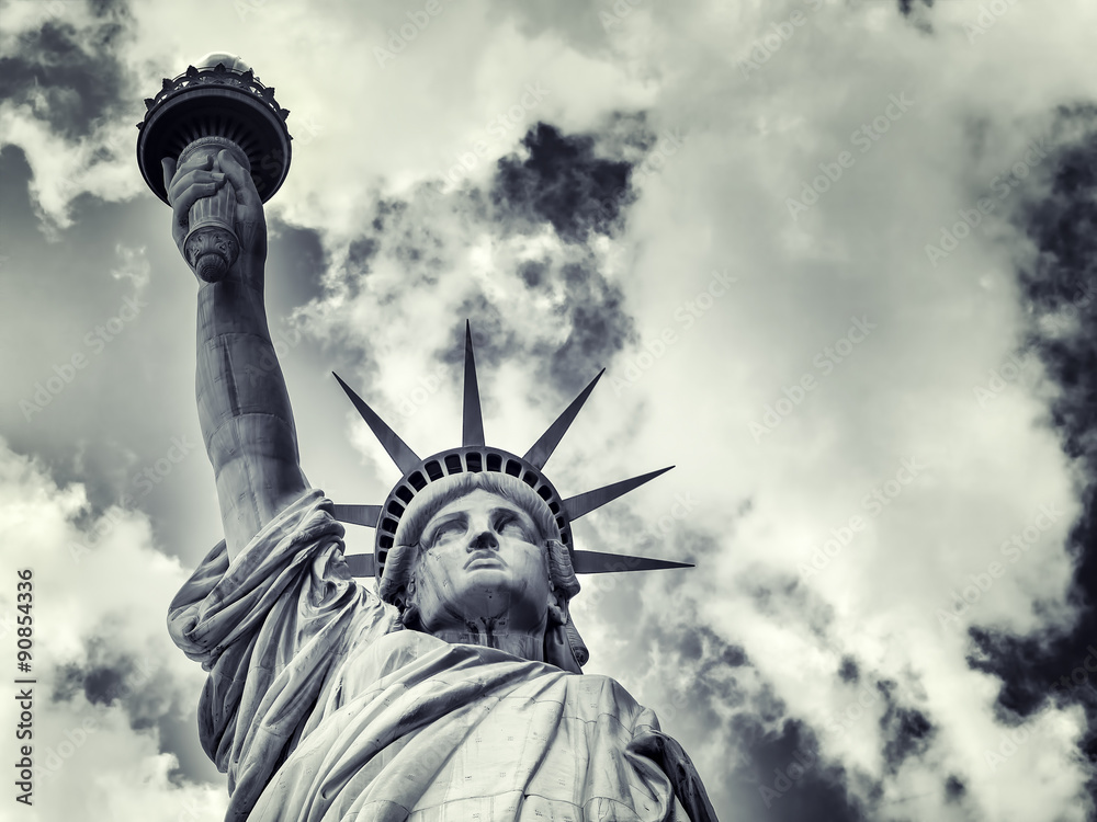 Fototapeta premium The Statue of Liberty with a dramatic sky