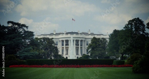 An establishing shot of the White House.  Modern video artificially aged to look like archival film footage.