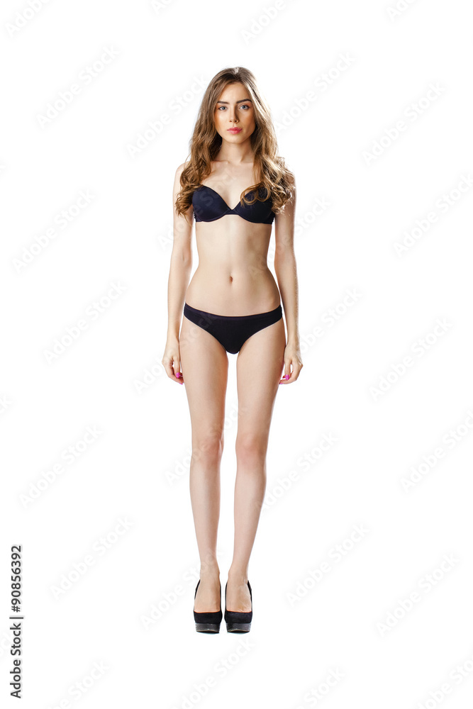 Full length portrait of a beautiful young model in black bikini Full length portrait of a beautiful young model in black bikini