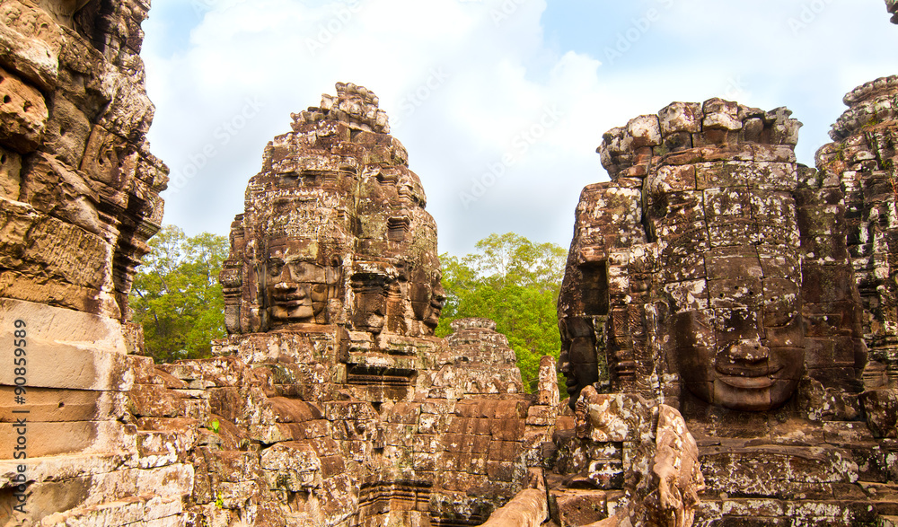 Carved faces in the Bayon Temple at Angkor, Cambodia