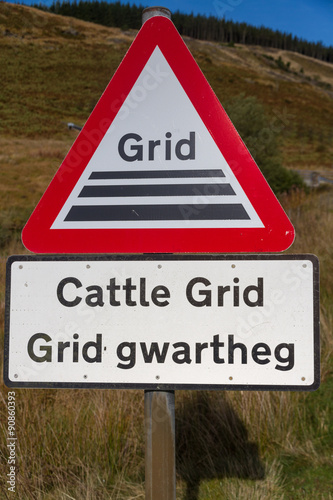 Welsh road warning sign, cattle grid.