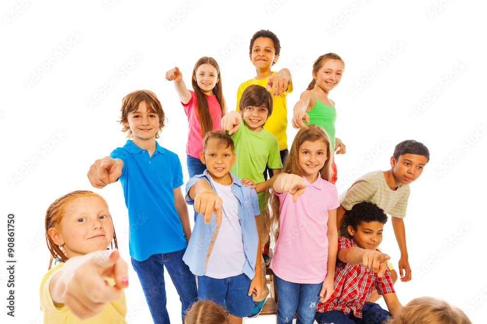 Large group of cute kids pointing at camera Large group of cute kids pointing at camera