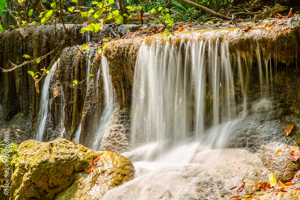 Beautiful waterfall in deep forest. Beautiful waterfall in deep forest.