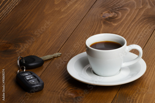 car keys and coffee cup