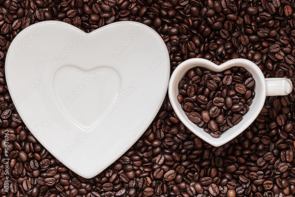 cup and saucer on coffee beans background cup and saucer on coffee beans background