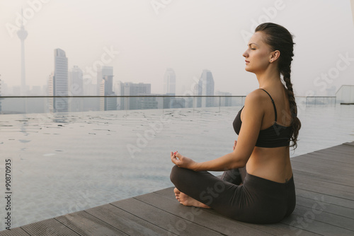 Photography Woman Doing Yoga in a Big City