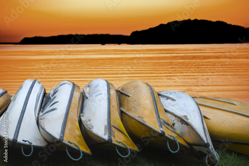Billede på lærred canadian canoes at sunset