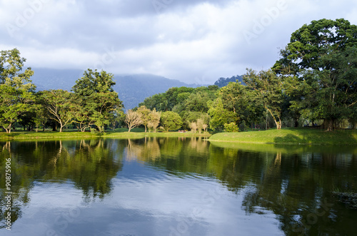 Fototapeta Naklejka Na Ścianę i Meble -  Taiping lake garden at sunset, Taiping, Malaysia - calm waters at the Taiping Lake Gardens