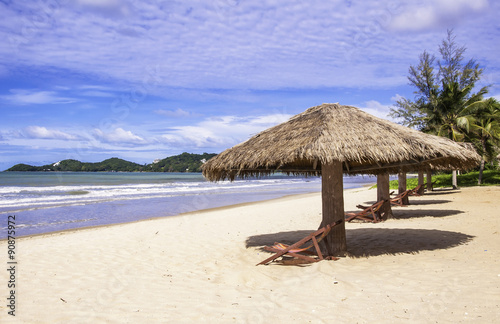 Tropical beach landscape with chairs and umbrella  Thailand