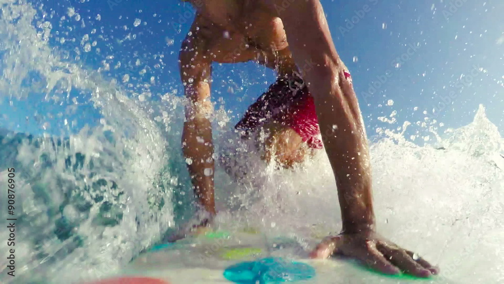POV Surfing on Blue Ocean Wave at Sunrise. SLOW MOTION Big Wave Surfing in Red Shorts. Drop In Bottom Turn Frontside Right. Summer Fun Lifestyle Extreme Sports. 