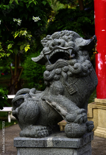 China-styled stone lion near the china pavilion at Lumpini park © mvtmdn