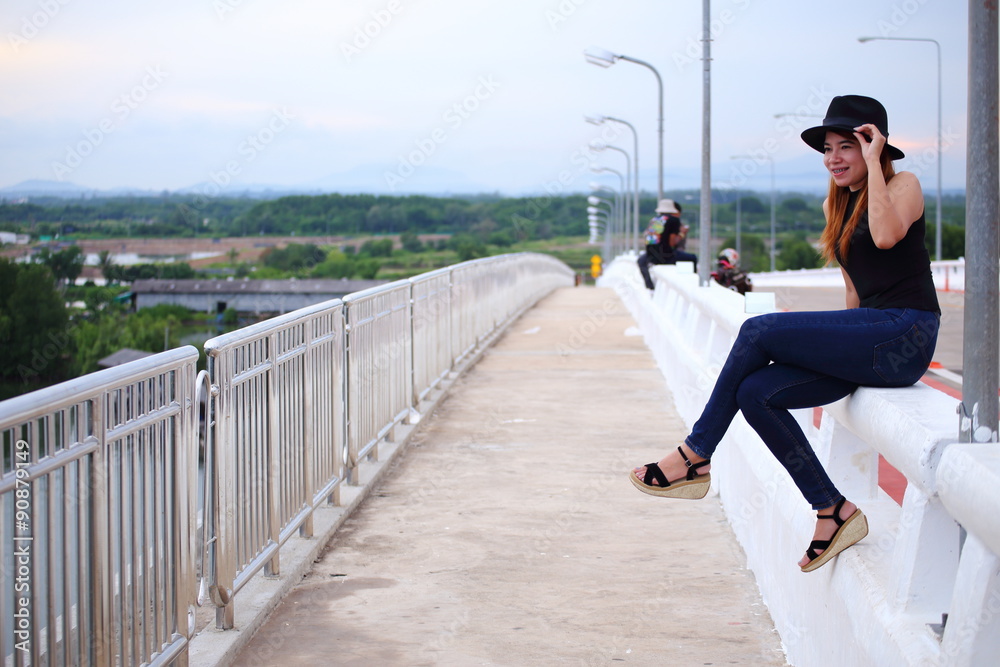 Woman on bridge