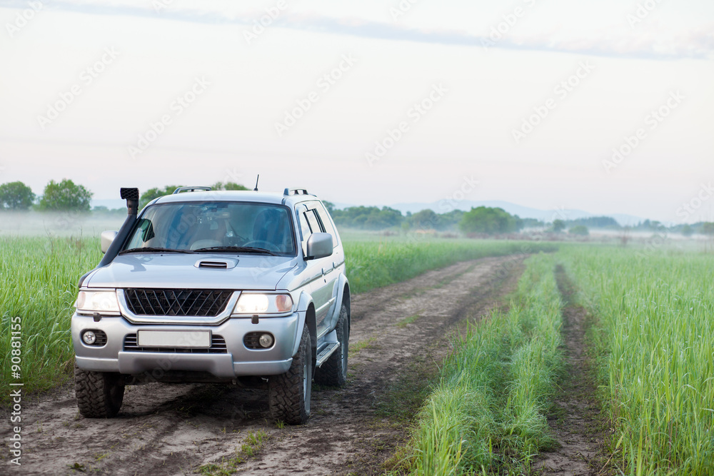 4x4 SUV with snorkel in a field