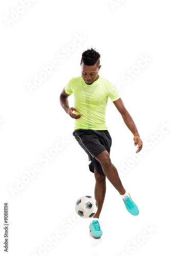 Dribbling a ball © DragonImages