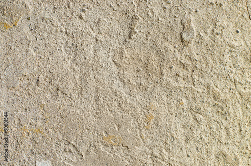 Peeling plasterwork on the cement wall