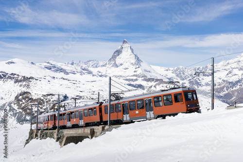 Zermatt, Switzerland - December 31, 2014-The train of Gonergratbahn running to the Gornergrat station in the famous touristic place with clear view to Matterhorn.