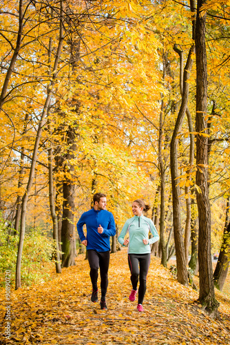 Young people jogging together in nature