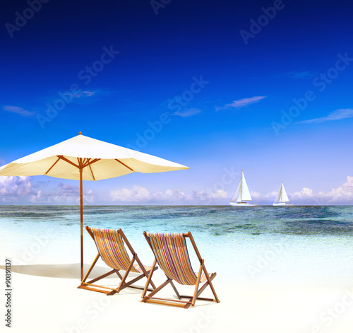 Deck Chair on the Trapical Beach Ocean Concept