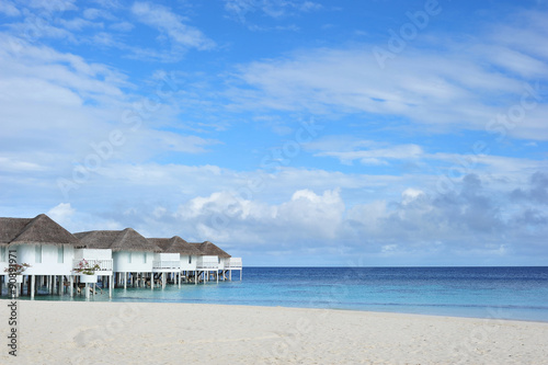 Maldive water villa - bungalows and white beach 