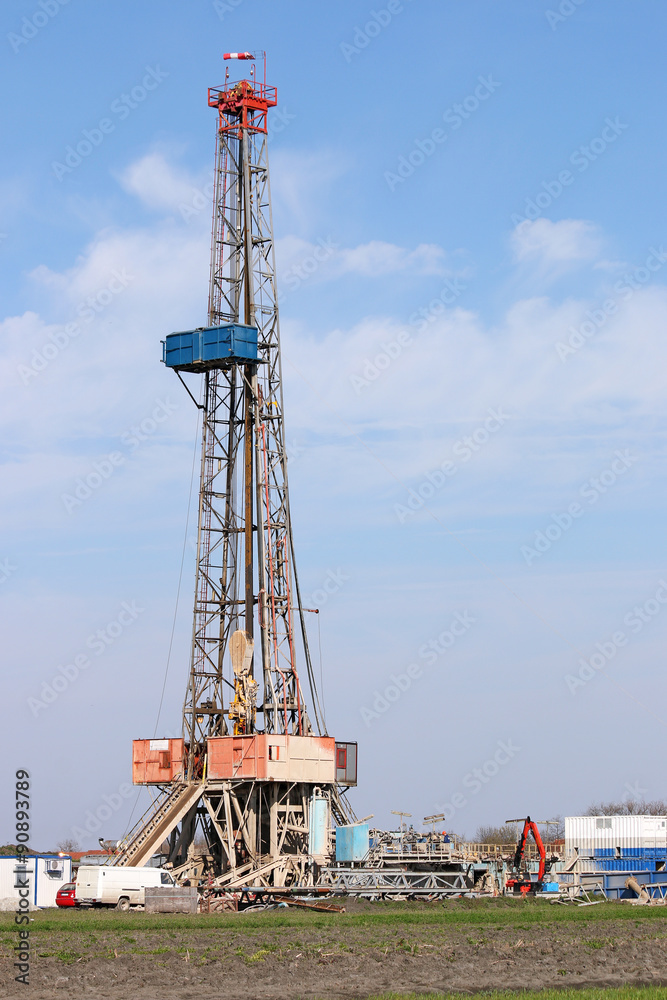 land oil drilling rig with equipment on oilfield