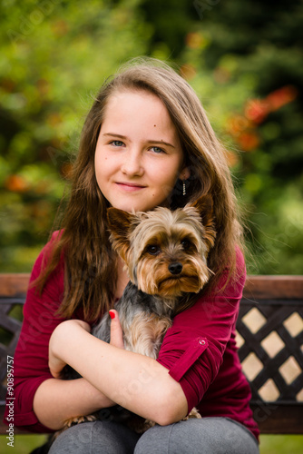 Portrait of girl with her dog