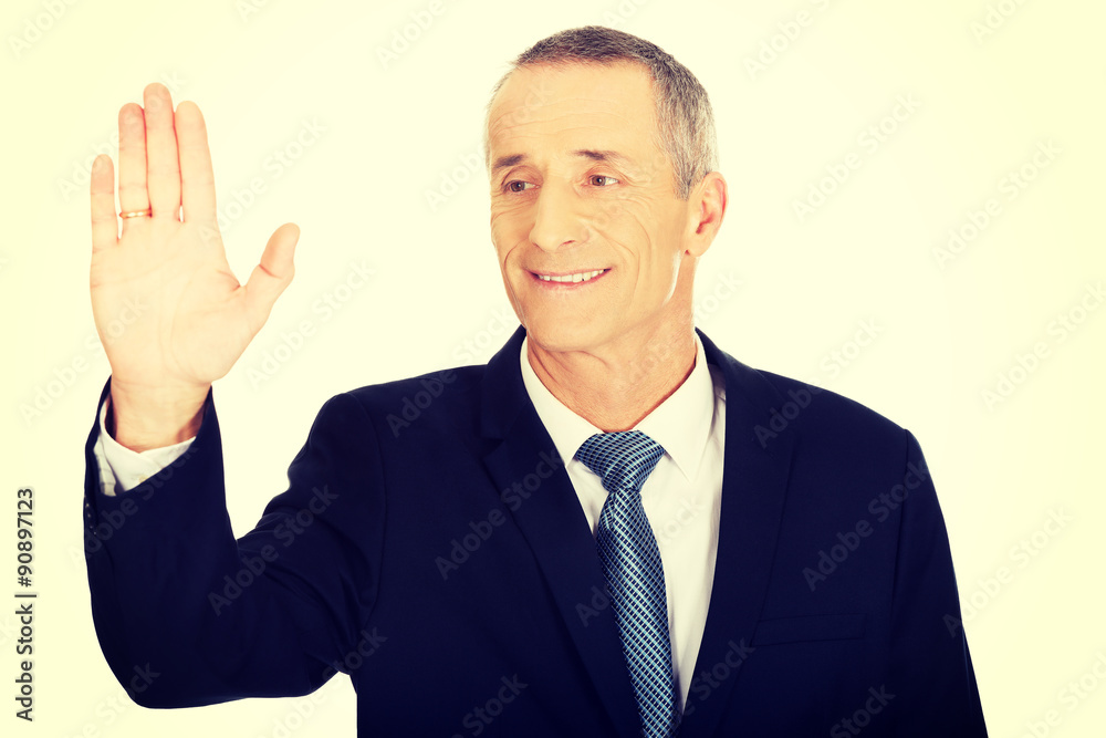 Portrait of businessman touching abstract screen Portrait of businessman touching abstract screen