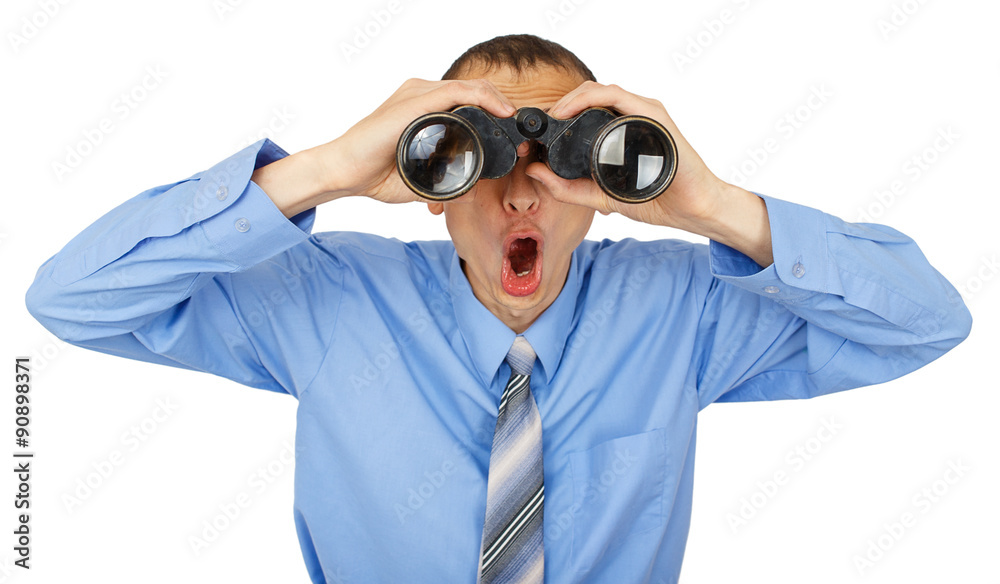 Shocked business man with blue tie with binoculars Shocked business man with blue tie with binoculars
