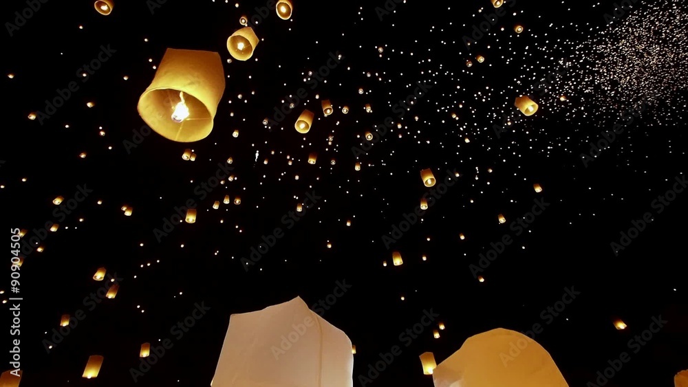 Loi Krathong Festival, floating lanterns being released into the night sky in Chiang Mai, Thailand.