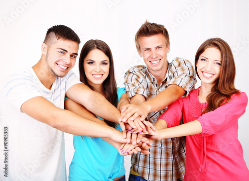 Group of happy young people...