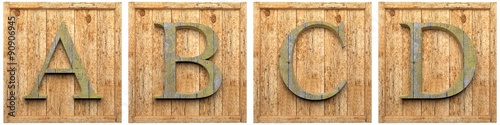 Group of wooden letters A B C D framed, isolated on white